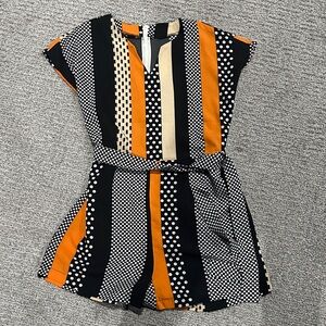 Stylish Black and Orange Patterned Romper